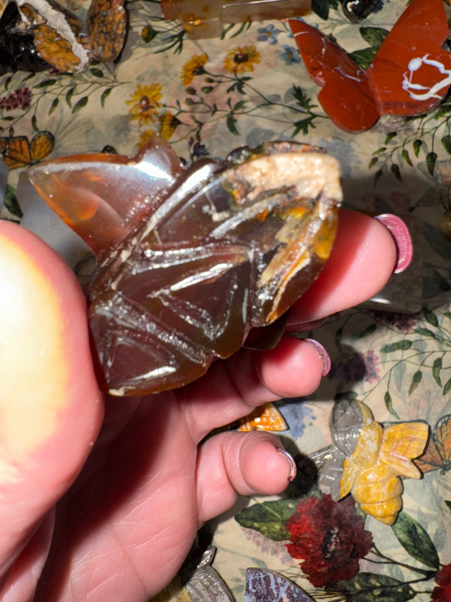 Carved amber bumblebees