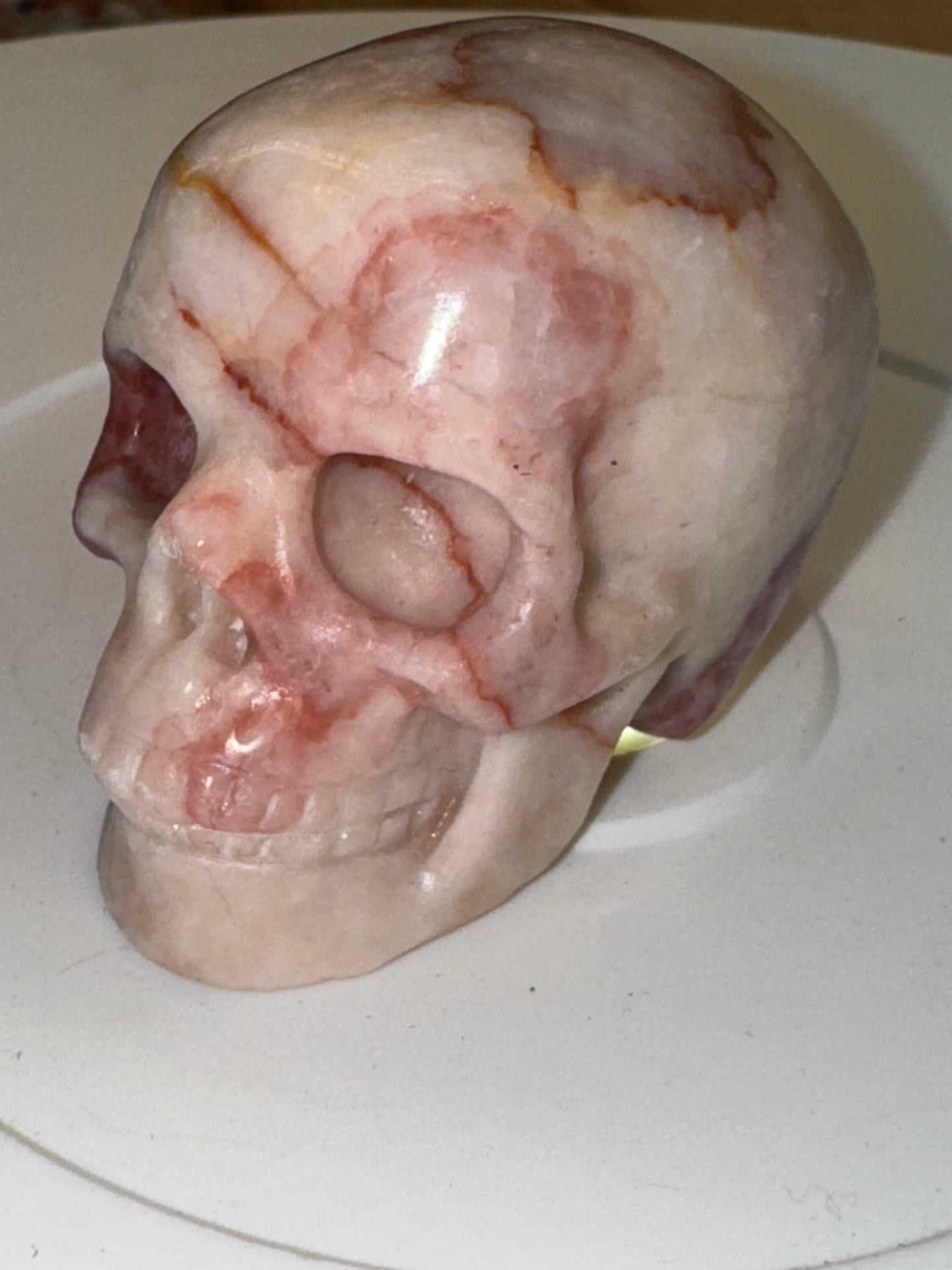 Pink banded calcite skull