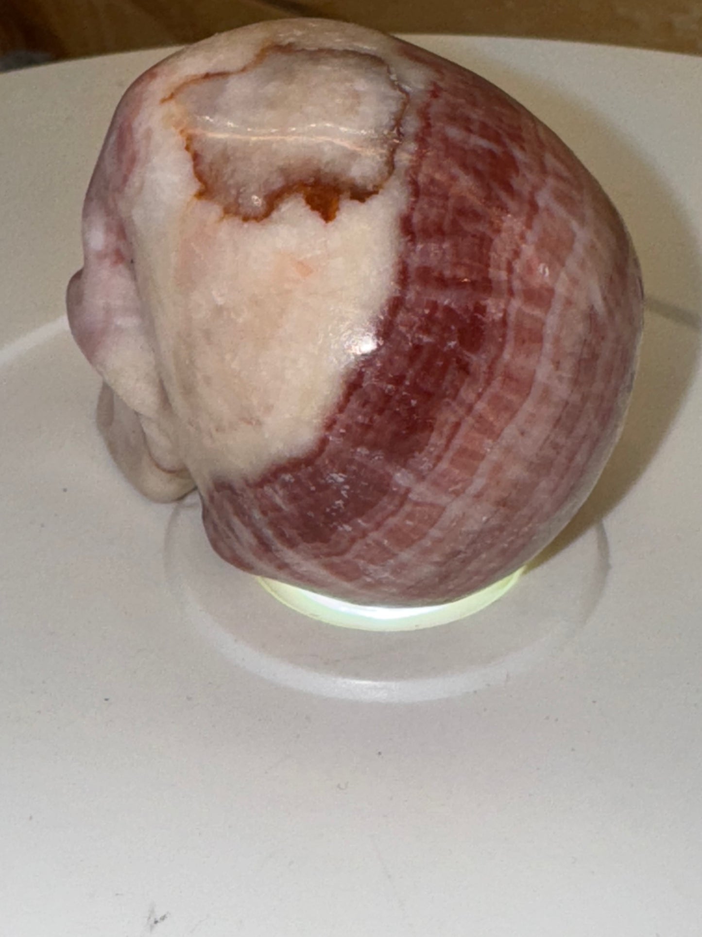Pink banded calcite skull