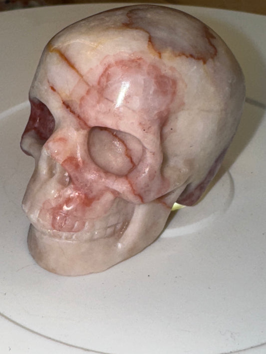 Pink banded calcite skull